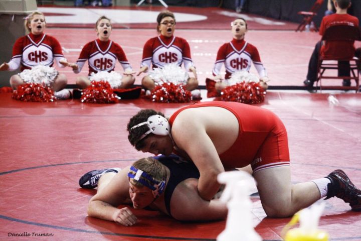 Aaron wrestles to a win at Regionals last season. Photo by Danielle Truman.