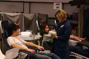 Students prepare to give blood during one of last year's blood drives. Photo by Jada Hounchell.