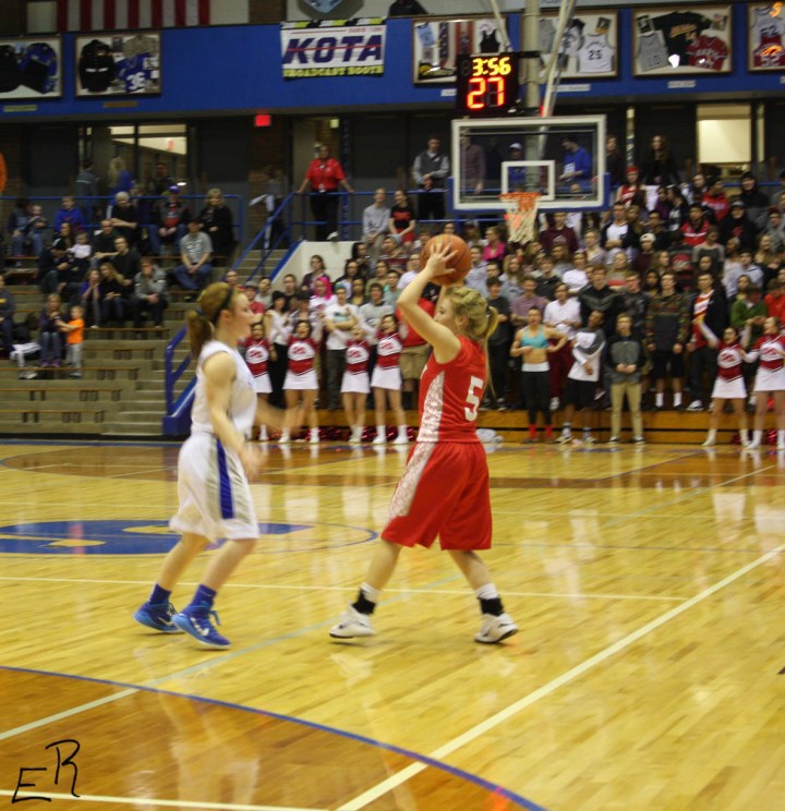 Tear Cottier looks to pass the ball against Stevens, with the Cobbler fans looking on. Photo by Emma Winckel.